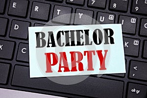 Word, writing Bachelor Party. Business concept for Stag Fun Celebrate written on sticky note paper on the black keyboard backgroun photo