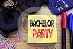 Word, writing Bachelor Party. Business concept for Stag Fun Celebrate written on sticky note paper on the wooden background. With