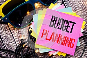 Word, writing Budget Planning. Business concept for Financial Budgeting written on sticky note with copy space on old wood wooden