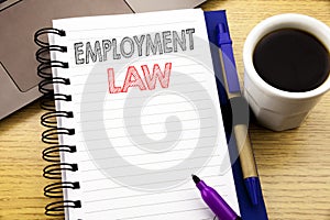 Word, writing Employment Law. Business concept for Employee Legal Justice written on notebook book on the wooden background in the