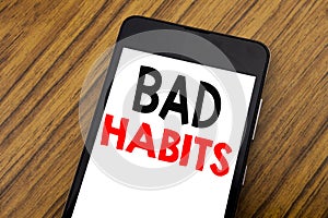 Word, writing handwriting Bad Habits. Business concept for Improvement Break Habitual Hebit Written on mobile phone cellphone, woo