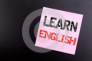 Word, writing Learn English. Business concept for Language School written on sticky note, black background with copy space