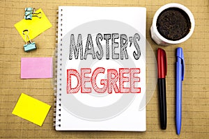 Word, writing Master s Degree. Business concept for Academic Education Written on notepad note paper background with space office