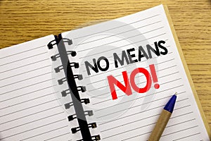 Word, writing No Means No. Business concept for Stop Anti Slogan written on notepad with copy space on old wood wooden backgr
