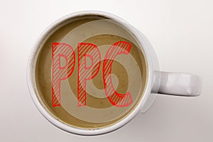 Word, writing PPC - Pay per Click text in coffee in cup. Business concept for Internet SEO Money on white background with copy spa