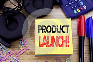 Word, writing Product Launch. Business concept for New Products Start written on sticky note paper on the wooden background. With