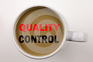 Word, writing Quality Control text in coffee in cup Business concept for Product Improvement or Check on white background with cop