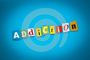 A word writing text - addiction - from colorful letters on a blue background. Headline, card with inscription. Psychologic concept photo