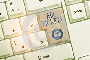 Word writing text Air Tickets. Business concept for individual is entitled to a seat on a flight on an aircraft White pc