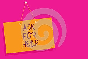 Word writing text Ask For Help. Business concept for Request to support assistance needed Professional advice Orange board wall me