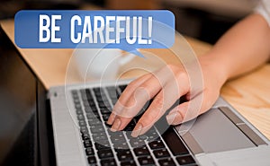 Word writing text Be Careful. Business concept for making sure of avoiding potential danger mishap or harm woman laptop