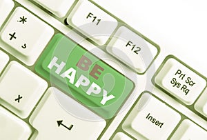 Word writing text Be Happy. Business concept for live every moment as the last love your life work family White pc