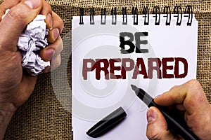 Word writing text Be Prepared. Business concept for Preparedness Challenge Opportunity Prepare Plan Management written by Man Hold photo