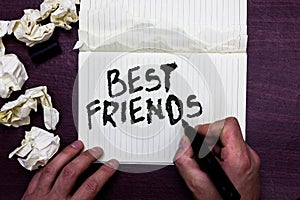 Word writing text Best Friends. Business concept for A person you value above other persons Forever buddies Man holding marker not