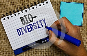 Word writing text Bio Diversity. Business concept for Variety of Life Organisms Marine Fauna Ecosystem Habitat Man holding marker