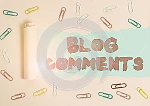 Word writing text Blog Comments. Business concept for Space at the end of each post for a reader to leave a comment Paper clip and