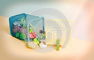 Word writing text Breaking News. Business concept for Special Report Announcement Happening Current Issue Flashnews Trash bin