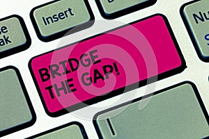 Word writing text Bridge The Gap. Business concept for Overcome the obstacles Challenge Courage Empowerment Keyboard key Intention