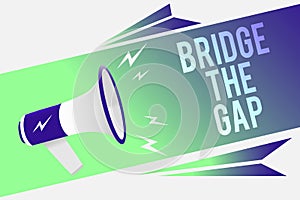 Word writing text Bridge The Gap. Business concept for Overcome the obstacles Challenge Courage Empowerment Megaphone loudspeaker
