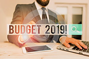 Word writing text Budget 2019. Business concept for estimate of income and expenditure for current year Male human wear
