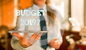 Word writing text Budget 2019 Question. Business concept for estimate of income and expenditure for next year Blurred