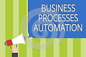 Word writing text Business Processes Automation. Business concept for performed to achieve digital transformation Man holding mega