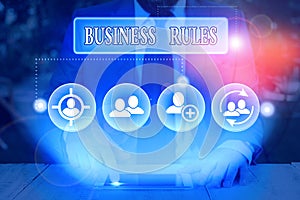 Word writing text Business Rules. Business concept for a specific directive that constrains or defines a business