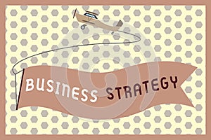 Word writing text Business Strategy. Business concept for Management game plan to achieve desired goal or objective