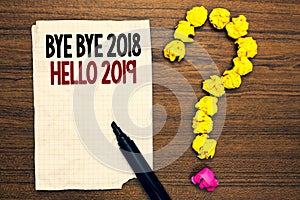 Word writing text Bye Bye 2018 Hello 2019. Business concept for Starting new year Motivational message 2018 is over Written torn p
