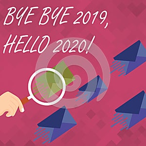 Word writing text Bye Bye 2019 Hello 2020. Business concept for saying goodbye to last year and welcoming another good