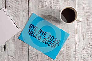 Word writing text Bye Bye 2019 Hello 2020. Business concept for saying goodbye to last year and welcoming another good