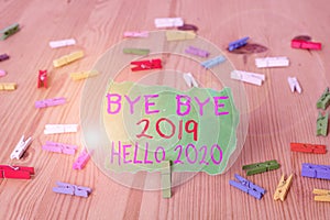 Word writing text Bye Bye 2019 Hello 2020. Business concept for saying goodbye to last year and welcoming another good one Colored