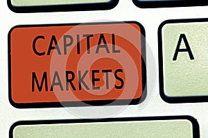 Word writing text Capital Markets. Business concept for Allow businesses to raise funds by providing market security