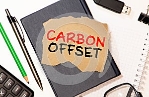 Word writing text Carbon Offset. Business concept for Reduction in emissions of carbon dioxide