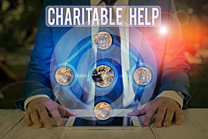 Word writing text Charitable Help. Business concept for system of giving money or help free to those who are in need Elements of
