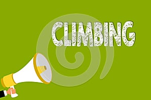 Word writing text Climbing. Business concept for sport activity of climbing mountains or cliffs Hard Tough Man holding
