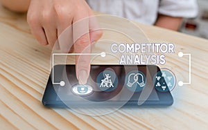 Word writing text Competitor Analysis. Business concept for assessment of the strengths and weaknesses of rival firm.