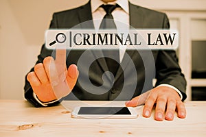 Word writing text Criminal Law. Business concept for legal system which relates to punishing those commits crime Male human wear