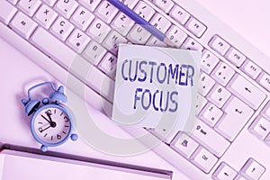 Word writing text Customer Focus. Business concept for orientation of an organization in serving its clients needs Empty copy