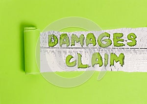 Word writing text Damages Claim. Business concept for Deanalysisd Compensation Litigate Insurance File Suit.