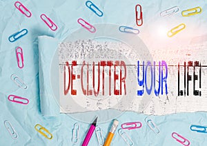 Word writing text De Clutter Your Life. Business concept for remove unnecessary items from untidy or overcrowded places Stationary