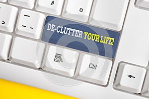 Word writing text De Clutter Your Life. Business concept for remove unnecessary items from untidy or overcrowded places White pc