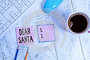 Word writing text Dear Santa. Business concept for letter intended for Santa Claus written by kids during Christmas