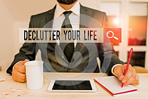 Word writing text Declutter Your Life. Business concept for To eliminate extraneous things or information in life Male human wear