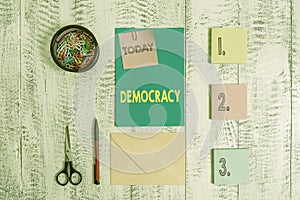 Word writing text Democracy. Business concept for freedom of the showing to express their feelings and beliefs Envelope