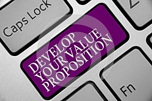 Word writing text Develop Your Value Proposition. Business concept for Prepare marketing strategy sales pitch Keyboard purple key