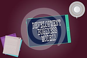 Word writing text Development Business Model. Business concept for rationale of how an organization created Tablet Empty photo