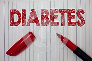 Word writing text Diabetes. Business concept for Chronic disease associated to high levels of sugar glucose in blood Notebook pape