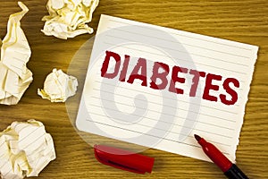Word writing text Diabetes. Business concept for Medical condition diagnosed with increased high level sugar written on Tear Notep