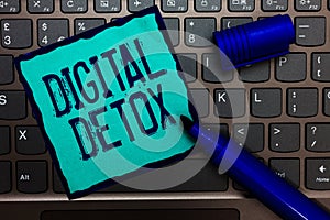 Word writing text Digital Detox. Business concept for Free of Electronic Devices Disconnect to Reconnect Unplugged Turquoise paper